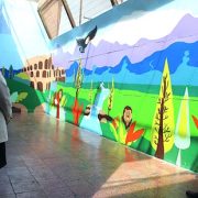 Jóvenes en proceso de reinserción crean un colorido mural de grandes proporciones en el Centro de Internación de Iquique